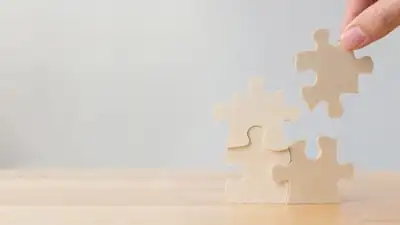 Puzzle pieces fitting together