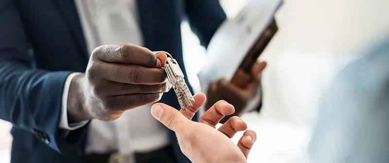 Passing the keys to a sold medical practice.