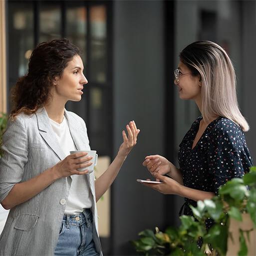 two woman talking